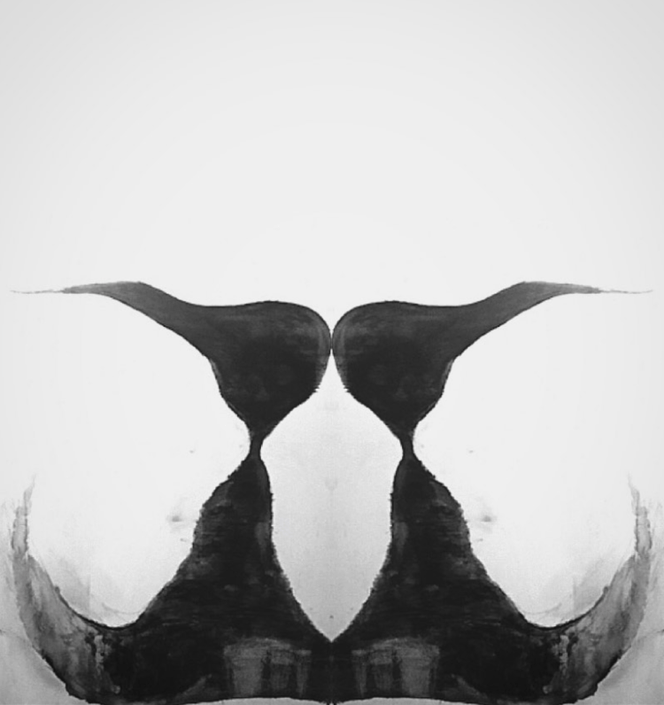 This is an abstract  charcoal drawing of two sisters. 