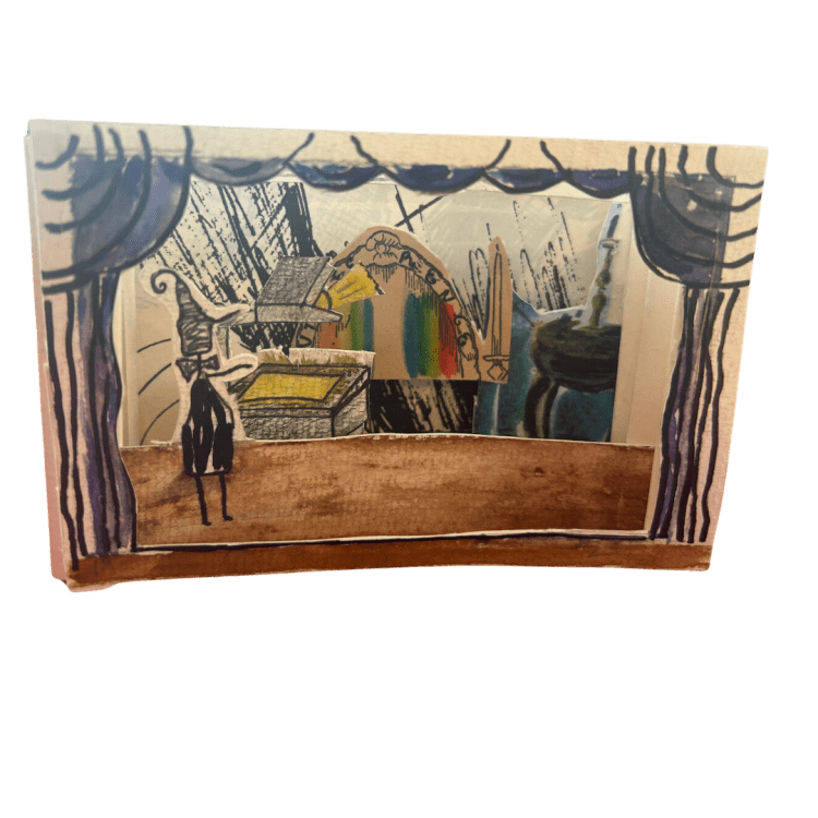 This is a scene sketch of the prelude to the play "Interference" in the form of a tiny tunnel book. Collage elements come together to form layers of a stage. In the front is a small figure named Fred, drawn by artist Alana Guarino, positioned at a projector. Light shines from the projector, illuminating the stage, and Fred's ideas.